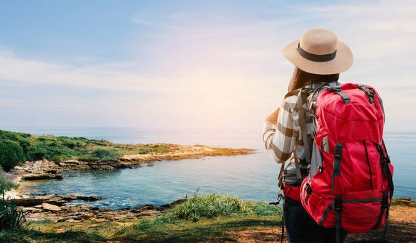 Asian woman backpack on sea , journey on holiday concept. - Foto, Imagem