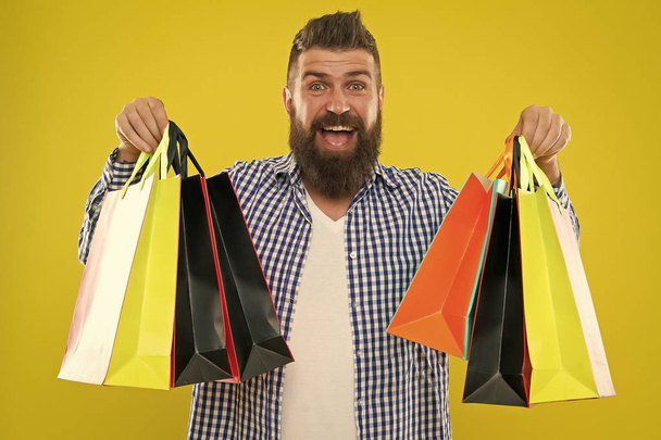 brutal caucasian hipster with moustache. Mature hipster with beard. Fashion man with beard. Bearded man. Male barber care. happy shopping. happy man with shopping bags. big sale. black friday - Valokuva, kuva