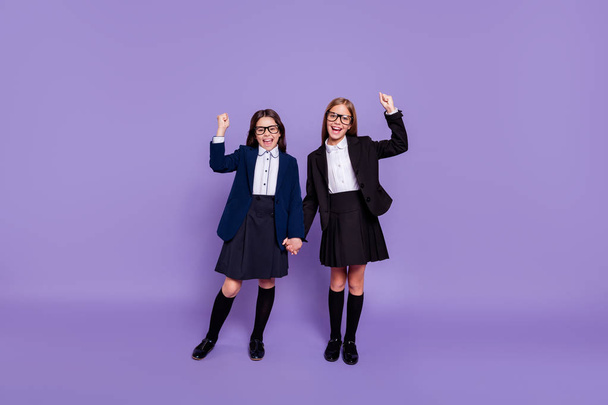 Full body photo of trendy stylish people raise fists scream yeah wear skirt long socks eyewear eyeglasses isolated over violet purple background - Φωτογραφία, εικόνα