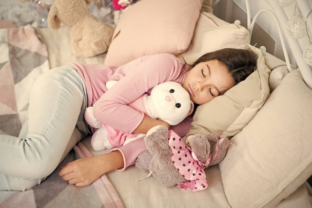 little child girl with xmas present. happy new year. Christmas shopping. waiting for santa. Winter. small girl sleeping at home. christmas family holiday. morning before Xmas. Sleep. its christmas - Fotografie, Obrázek