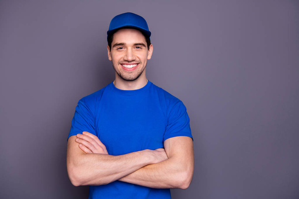 Close up photo express specialist he him his delivery boy strong arms crossed beaming smile self-confident person order offer customer wear blue t-shirt cap corporate suit isolated grey background - Foto, imagen