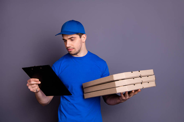 Close up photo express rapid speed specialist he him his delivery boy hold strong arms three parcel boxes clipboard search customer list wear blue t-shirt cap corporate suit isolated grey background - Valokuva, kuva