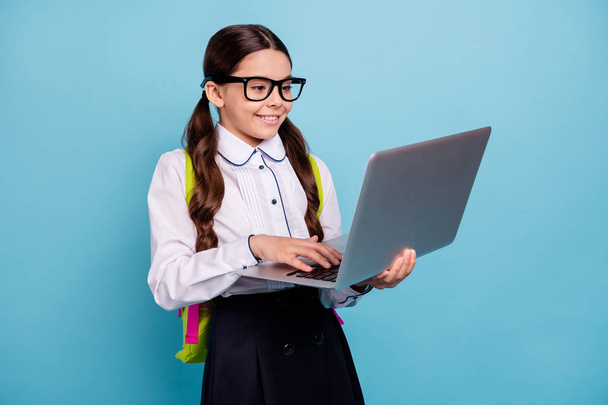 Photo of nice school lady classroom modern technologies lesson notebook hands wear specs white shirt isolated blue background - Φωτογραφία, εικόνα