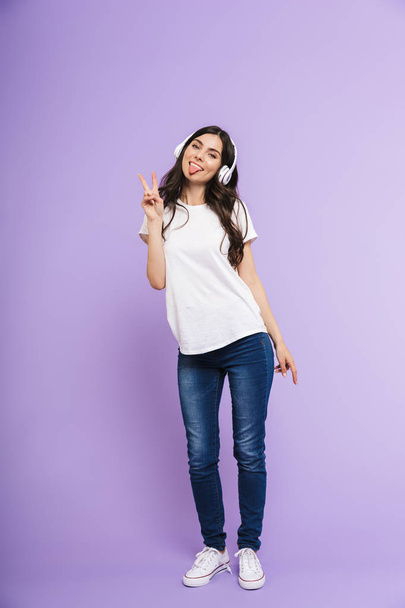 Full length portrait of a cheerful casual woman - Photo, image