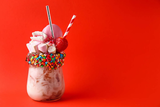 Delicious freak shake on color background - Fotoğraf, Görsel