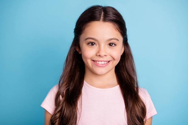 Portrait of charming nice child glad content candid adorable small funky hairdo haircut wear modern light-colored outfit isolated on blue background - Photo, image