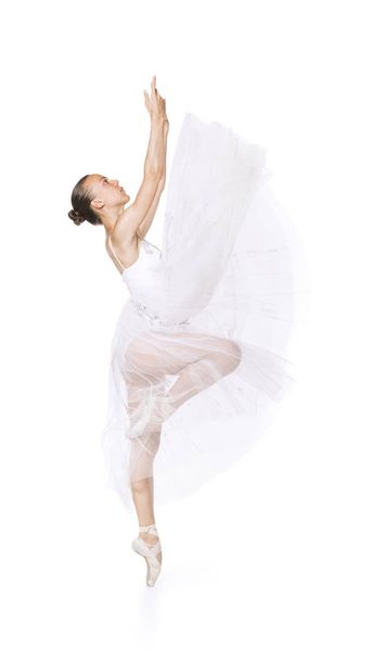 Slender girl in a white corset tutu dancing ballet. - Fotoğraf, Görsel