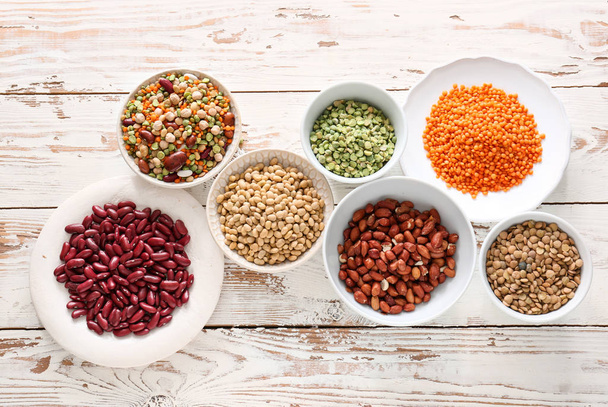 Assortment of legumes on white table - Foto, immagini
