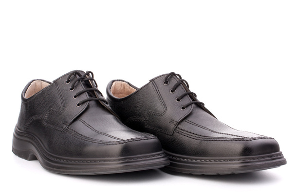 Black glossy man's shoes with shoelaces - Fotoğraf, Görsel
