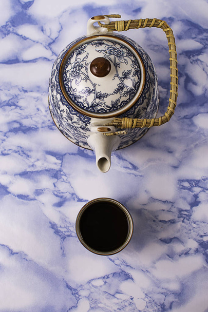 Teapot and cup of china blue chinese porcelain tea. - Fotó, kép