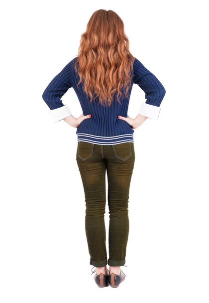 back view of standing young beautiful redhead woman. - Zdjęcie, obraz