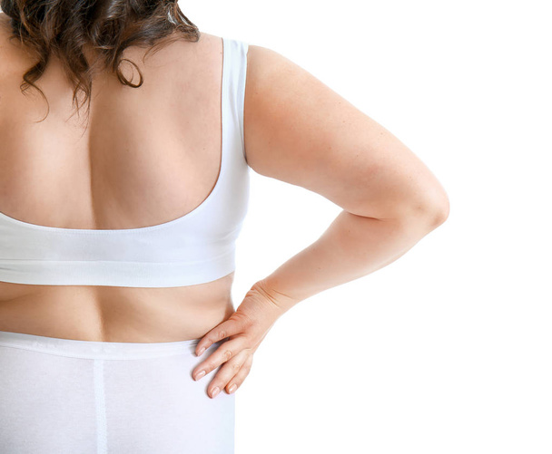 Beautiful plus size woman on white background, back view. Concept of body positive - Photo, Image