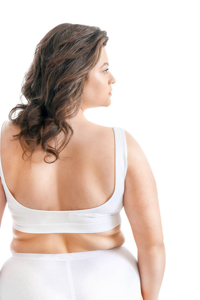 Beautiful plus size woman on white background. Concept of body positive - Fotografie, Obrázek
