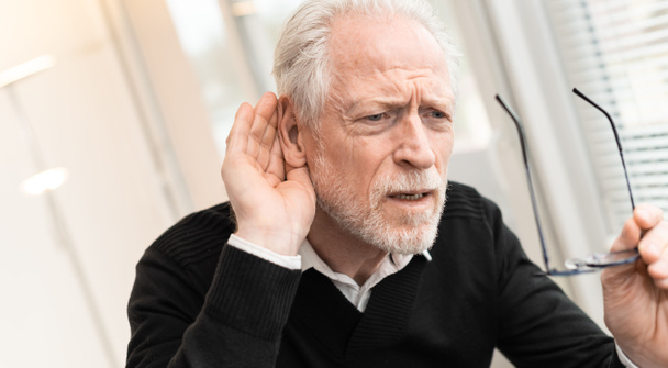 Senior man with hearing problems - Photo, image