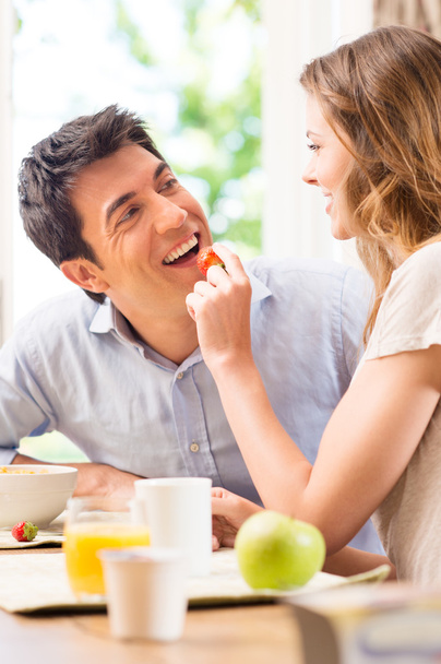 Happy Young Couple Having Breakfast - Foto, Imagen