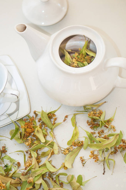 Brew tea with dried linden blossom in natural environment - Photo, Image
