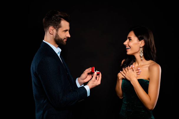 Profile side view portrait of nice gorgeous lovely attractive luxury fascinating cheerful dreamy two person giving receiving expensive dream rich wealthy guy isolated over black background - Fotó, kép