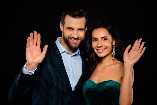 Close-up portrait of his he her she nice-looking attractive glamorous luxurious cheerful cheery two people waving isolated over black background - 写真・画像