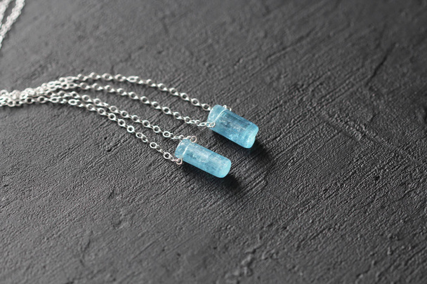 Crystal blue aquamarine beryl on a silver chain. Pendant aquamar - Photo, Image