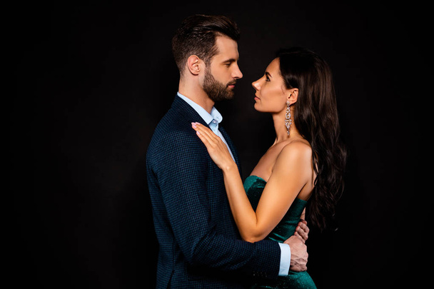Profile side view portrait of his he her she nice-looking attractive shine glamorous lovely luxurious passionate two person St Valentine day isolated over black background - Photo, Image