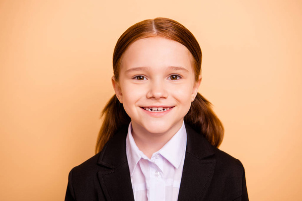 Close-up portrait of her she nice lovely attractive content cheerful cheery pre-teen red girl nerd wearing formal wear ready back to school isolated over beige pastel background - Foto, afbeelding