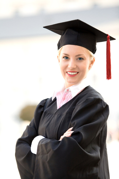 Female graduate smiling - Φωτογραφία, εικόνα
