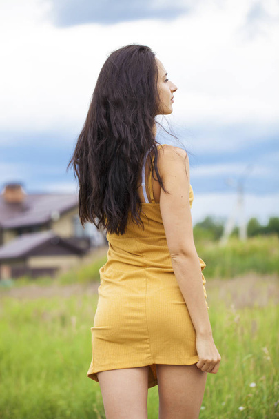Female brunette hair, rear view, summer park - Fotografie, Obrázek
