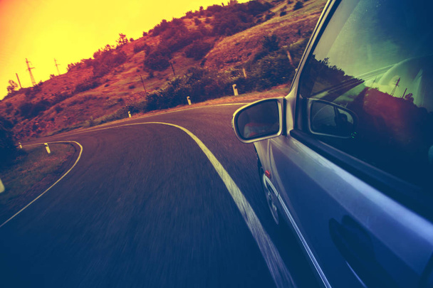 automobile on the road at sunset. Travel concept. - Foto, Imagem