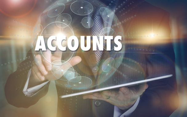 A hand selecting a Accounts business concept on a futuristic com - Photo, Image