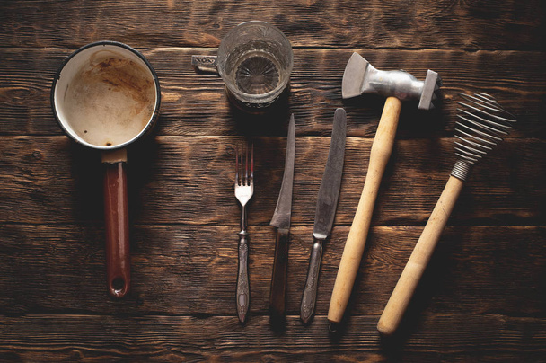 Old kitchen utensils on a rural kitchen table background. - Foto, Imagem