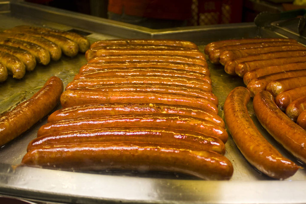 Traditional viennese sausage at showcase for sale - Foto, imagen