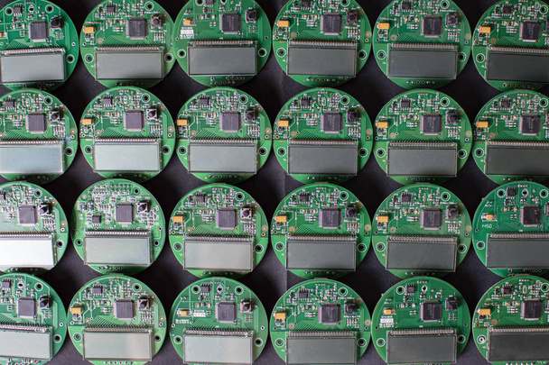 placas eletrônicas redondas com exposição, microchip e processador, muitos componentes do medidor
 - Foto, Imagem