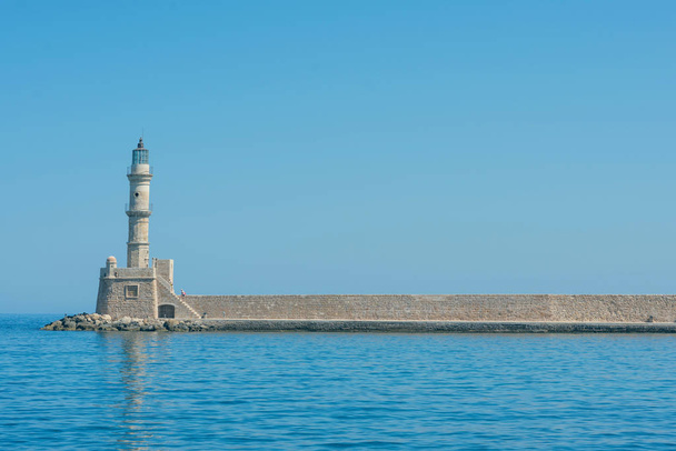 Panoramic view of the antiquity lighthouse in the old Venetian harbor Of Chania. Island of Crete. Greece  - Zdjęcie, obraz