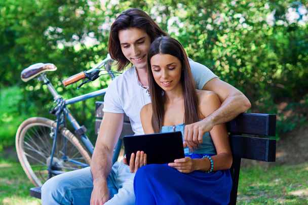 young couple with tablet - Photo, Image