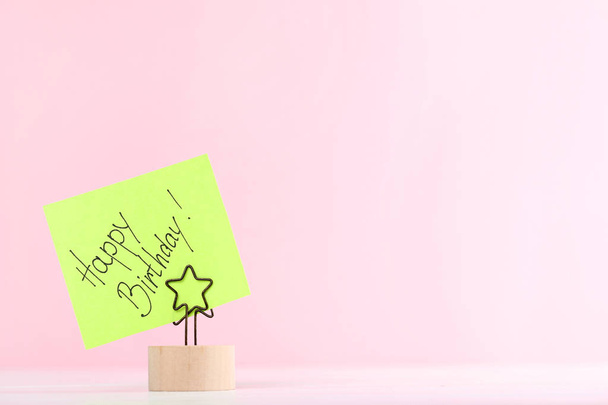 Paper with text Happy Birthday on pink background - Fotografie, Obrázek