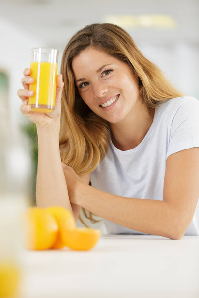 nutritionist woman with orange juice - Fotó, kép