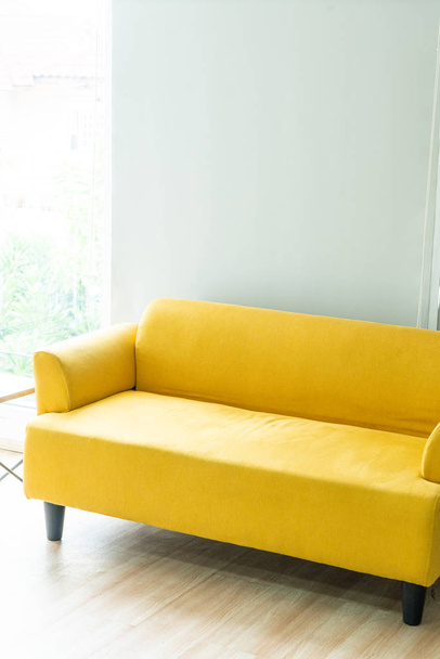 empty yellow sofa - 写真・画像