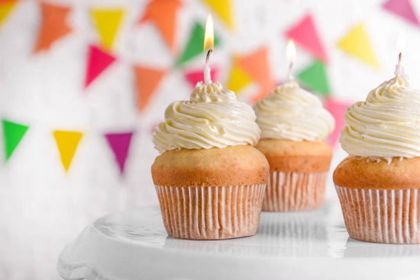 Stand with tasty Birthday cupcakes, closeup - Fotografie, Obrázek