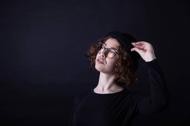 Young caucasian highschool girl with curly hair and round eyeglasses - Foto, imagen