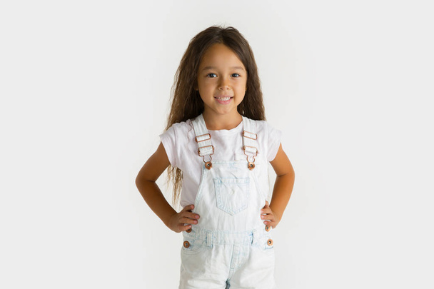 Portrait of little girl isolated on white studio background - Photo, image