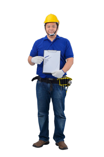 construction foreman in blue shirt with Protective gloves, helme - 写真・画像