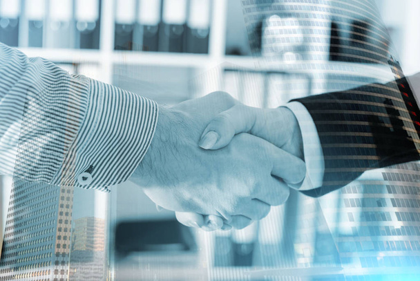 Business handshake; multiple exposure - Photo, Image