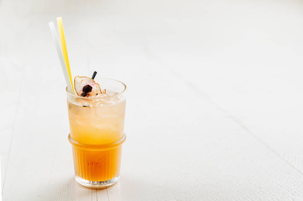 Fresh summer drink with fruits on blurred background  - Φωτογραφία, εικόνα