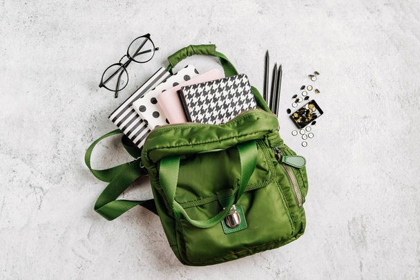 Flat lay with backpack, school supplies and books for study - Фото, изображение