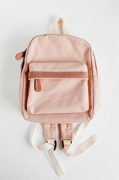 Stylish pale pink backpack on white background - Foto, Imagen
