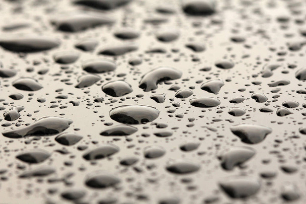 Drops of Rain or Water Drop on the Hood of the Car. Rain Drops o - Foto, afbeelding
