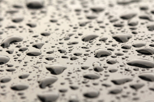 Drops of Rain or Water Drop on the Hood of the Car. Rain Drops o - Foto, Imagem