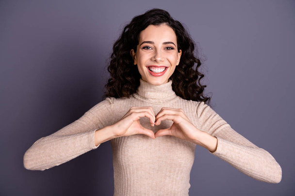 Close up photo pretty nice she her lady girlish beaming smile making hands arms fingers heart shape figure form symbolizing cardiac health wear casual pastel sweater pullover isolated grey background - Foto, Bild