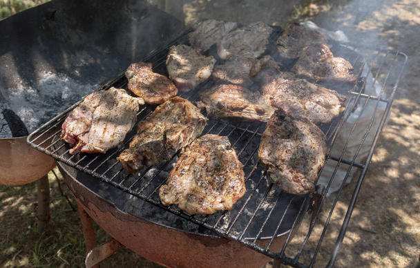 Crete, Greece. Jnue 2019. Pork chops cooking on a barbeque. - Photo, Image