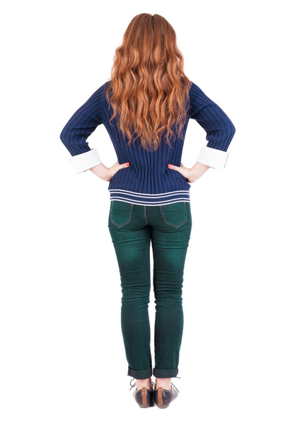 back view of standing young beautiful redhead woman. - Фото, зображення